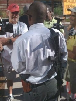 assault-rifle-at-obama-rally Where are the headlines announcing that it was just a radio stunt?