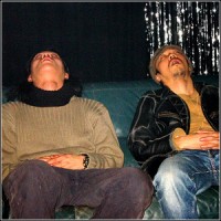 Two rabid Wolf Blitzer fans watching his show on CNN