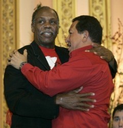 US-POLITICS-CHAVEZ-GLOVER Hugo Chavez leads and Danny Glover follows as they dance around the issues.