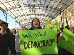 iran-protest Democracy? You want democracy? Haven't you heard about global warming?