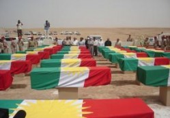 Thousands of Kurds attended the burial ceremony for victims of Saddam Hussein's Iraqi genocide.