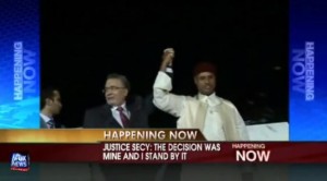 The freed Lockerbie bomber celebrates his release and arrival in Libya with Muammar Gaddafi's son