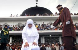 woman_caned This isn't just another culture, it's another planet.